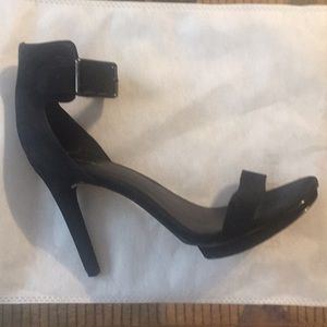 Black suede Calvin Klein platforms